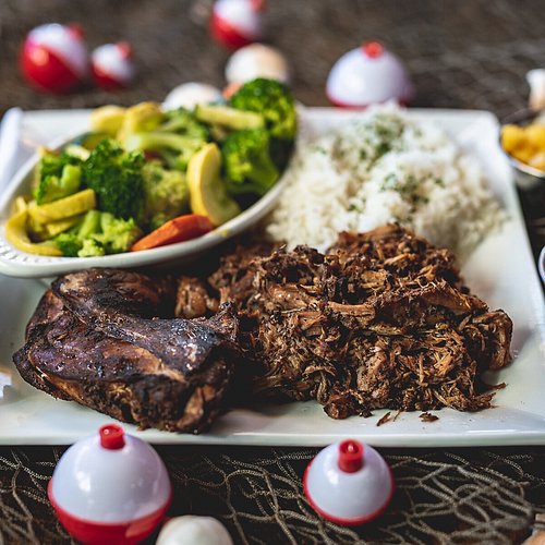 Bobbers Island Grill signature dishes Jerk Combo
Seafood Alfredo
Lobster Mac N Cheese